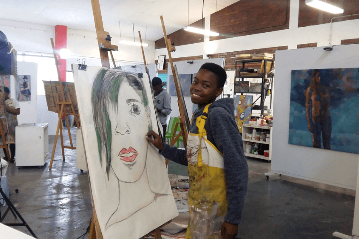 A learner doing art
